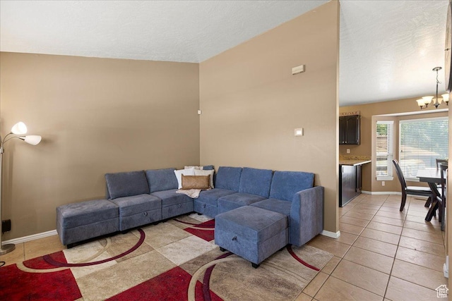 6410 W Martin Way S, West Valley City, UT 84128 - living room with lofted ceiling, a chandelier, light tile patterned floors, and a textured ceiling
