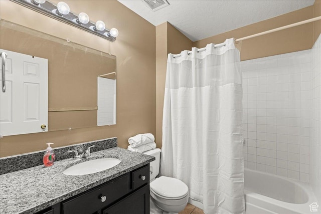 6410 W Martin Way S, West Valley City, UT 84128 - full bathroom with vanity, shower / bath combo with shower curtain, a textured ceiling, and tile patterned floors
