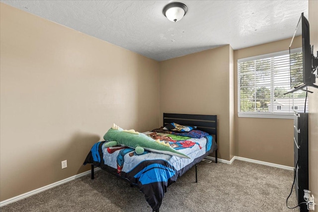 6410 W Martin Way S, West Valley City, UT 84128 - bedroom with a textured ceiling and carpet