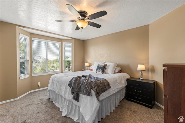 6410 W Martin Way S, West Valley City, UT 84128 - carpeted bedroom featuring a ceiling fan and a textured ceiling