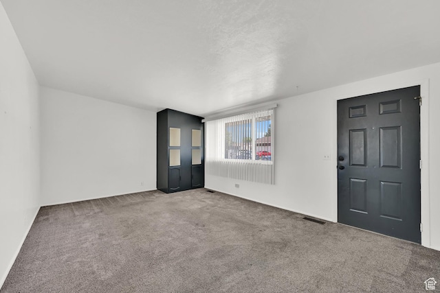 2743 W 7460 S, West Jordan, UT 84084 - foyer entrance featuring carpet flooring