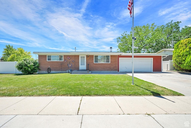 2743 W 7460 S, West Jordan, UT 84084 - ranch-style home featuring a garage, concrete driveway, and brick siding