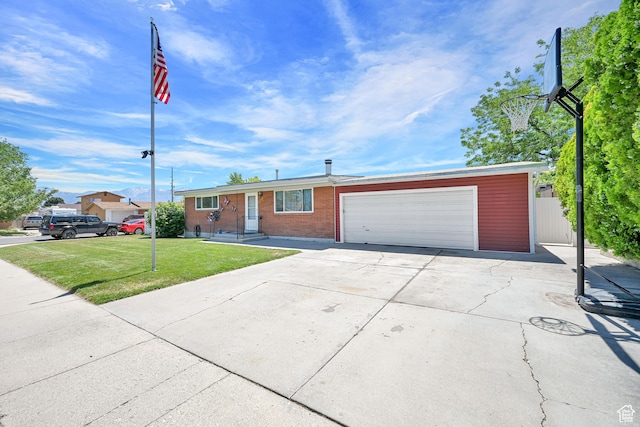 2743 W 7460 S, West Jordan, UT 84084 - single story home featuring a front yard, an attached garage, concrete driveway, and brick siding