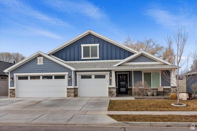 1949 N 2350 W Unit 203, Clinton, UT 84015 - craftsman-style home featuring board and batten siding, a porch, stone siding, and driveway