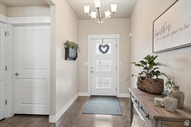 1949 N 2350 W Unit 203, Clinton, UT 84015 - foyer featuring wood finished floors and a chandelier
