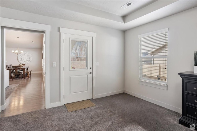 1949 N 2350 W Unit 203, Clinton, UT 84015 - carpeted entrance foyer featuring a chandelier and baseboards