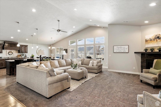 1949 N 2350 W Unit 203, Clinton, UT 84015 - living area featuring recessed lighting, a fireplace, ceiling fan, high vaulted ceiling, and wood finished floors