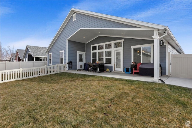 1949 N 2350 W Unit 203, Clinton, UT 84015 - back of property featuring a patio area, a fenced backyard, and a hot tub