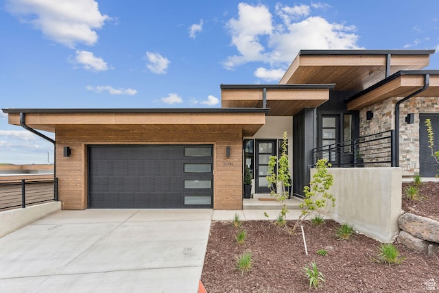 11811 N Apex Way Unit 66, Hideout, UT 84036 - modern home with concrete driveway and an attached garage