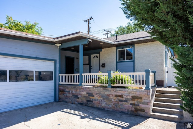 10257 S 1280 E, Sandy, UT 84094 - ranch-style home featuring a porch and a garage