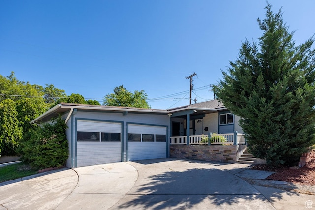 10257 S 1280 E, Sandy, UT 84094 - ranch-style home featuring covered porch, driveway, and an attached garage