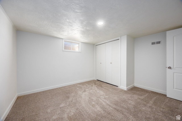 10257 S 1280 E, Sandy, UT 84094 - below grade area featuring carpet flooring and a textured ceiling