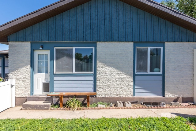 10257 S 1280 E, Sandy, UT 84094 - view of side of home featuring entry steps and brick siding