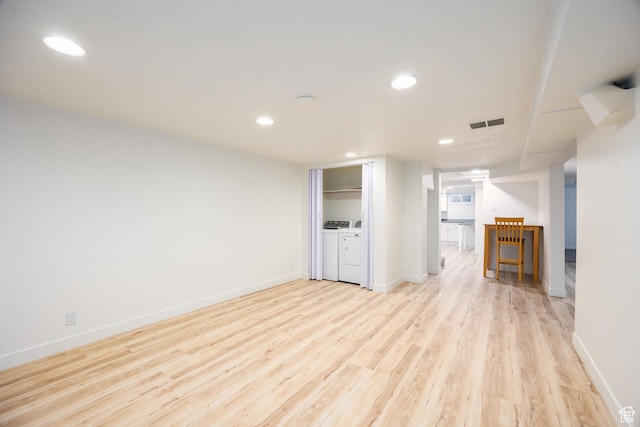 10257 S 1280 E, Sandy, UT 84094 - unfurnished living room with light wood finished floors, recessed lighting, and separate washer and dryer
