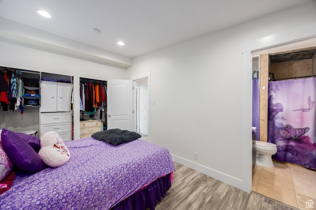 10257 S 1280 E, Sandy, UT 84094 - bedroom with recessed lighting, ensuite bath, and wood finished floors