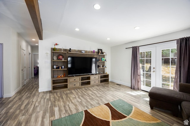10257 S 1280 E, Sandy, UT 84094 - living area featuring french doors, wood finished floors, recessed lighting, and lofted ceiling