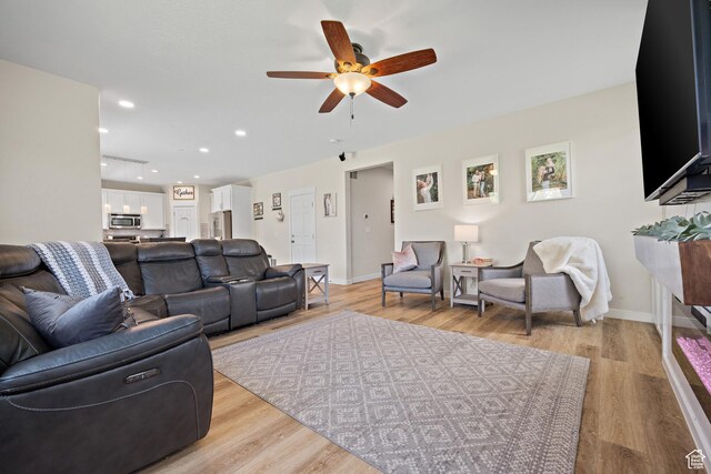 8791 N Suffolk Ln, Eagle Mountain, UT 84005 - living room featuring ceiling fan, light wood-type flooring, and recessed lighting