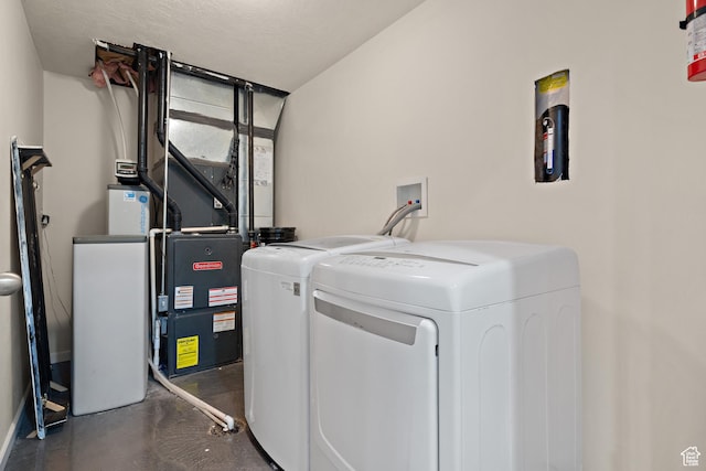 8791 N Suffolk Ln, Eagle Mountain, UT 84005 - laundry area featuring separate washer and dryer and baseboards