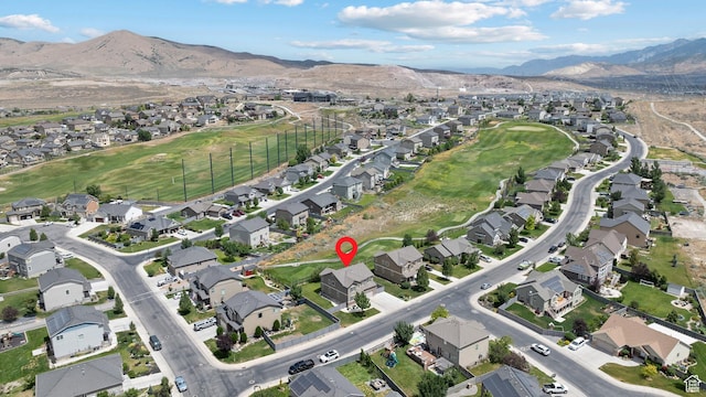 8791 N Suffolk Ln, Eagle Mountain, UT 84005 - aerial overview of property's location with nearby suburban area and mountains