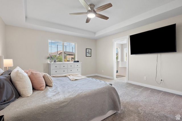 8791 N Suffolk Ln, Eagle Mountain, UT 84005 - carpeted bedroom with a tray ceiling, ensuite bath, and ceiling fan
