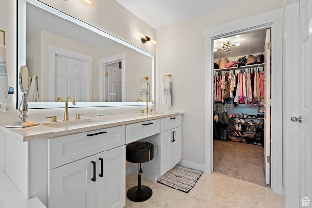 8791 N Suffolk Ln, Eagle Mountain, UT 84005 - bathroom with double vanity and a walk in closet