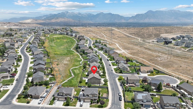 8791 N Suffolk Ln, Eagle Mountain, UT 84005 - aerial view of property's location with nearby suburban area and a mountainous background