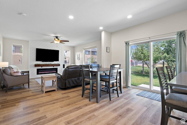 8791 N Suffolk Ln, Eagle Mountain, UT 84005 - dining space featuring light wood-type flooring, a ceiling fan, plenty of natural light, and recessed lighting