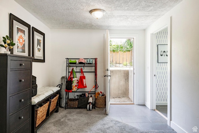 5980 S Sweet Basil W, Taylorsville, UT 84129 - mudroom with a textured ceiling and light tile patterned flooring