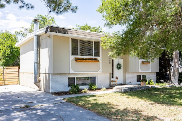5980 S Sweet Basil W, Taylorsville, UT 84129 - view of front of house featuring brick siding