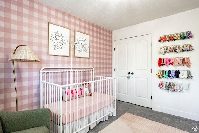5980 S Sweet Basil W, Taylorsville, UT 84129 - bedroom with a closet, wallpapered walls, carpet, a nursery area, and a textured ceiling