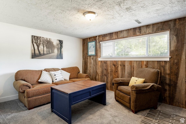 5980 S Sweet Basil W, Taylorsville, UT 84129 - living area with wooden walls, light colored carpet, and a textured ceiling