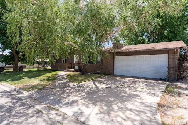 481 W Oak Crest Dr, Monticello, UT 84535 - view of front of home featuring brick siding, concrete driveway, an attached garage, a front yard, and crawl space