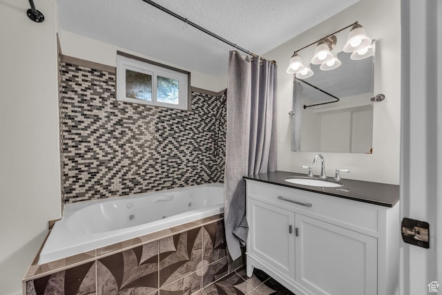 554 17th St, Ogden, UT 84404 - full bath featuring a combined bath / shower with jetted tub, vanity, and a textured ceiling