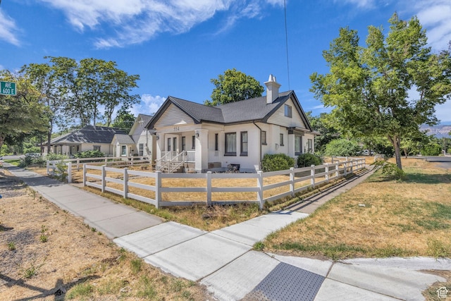 554 17th St, Ogden, UT 84404 - modern farmhouse style home with a fenced front yard