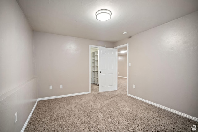 967 E Eaglewood Dr, North Salt Lake, UT 84054 - unfurnished bedroom featuring carpet and a spacious closet