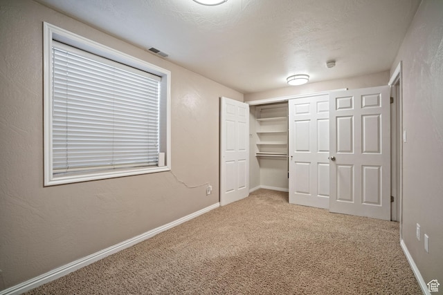 967 E Eaglewood Dr, North Salt Lake, UT 84054 - unfurnished bedroom featuring carpet floors and a closet