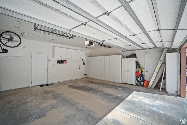 967 E Eaglewood Dr, North Salt Lake, UT 84054 - garage featuring a garage door opener