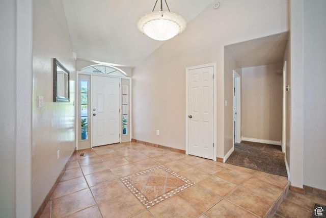 967 E Eaglewood Dr, North Salt Lake, UT 84054 - entryway featuring light tile patterned floors and high vaulted ceiling
