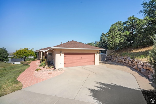 967 E Eaglewood Dr, North Salt Lake, UT 84054 - view of front of house with stucco siding, concrete driveway, an attached garage, and a front yard