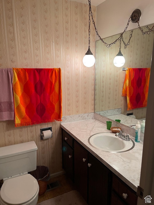 1692 W 300 N, West Point, UT 84015 - bathroom with vanity, tile patterned flooring, and wallpapered walls