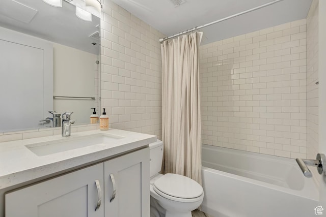 230 E Broadway Unit 401, Salt Lake City, UT 84111 - full bathroom featuring vanity, shower / bath combination with curtain, and tile walls