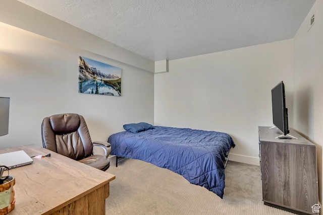 230 E Broadway Unit 401, Salt Lake City, UT 84111 - bedroom with carpet and a textured ceiling
