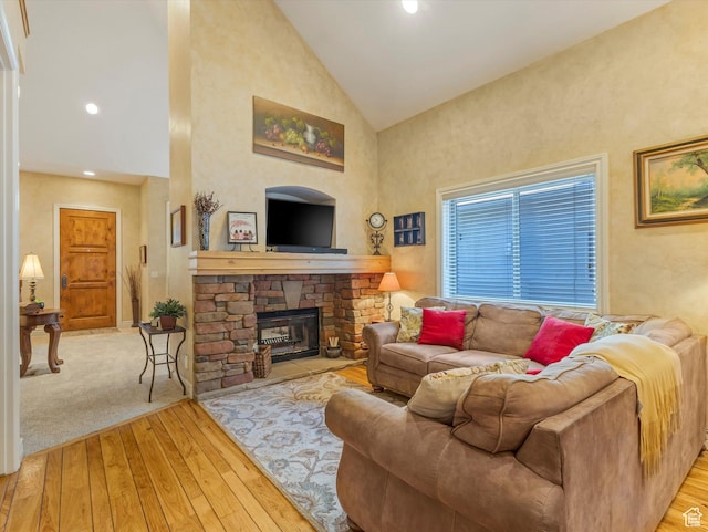 1832 E Cottonwood Glen Ct, Salt Lake City, UT 84117 - living room with high vaulted ceiling, hardwood / wood-style floors, a fireplace, and recessed lighting