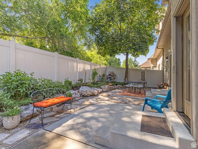1832 E Cottonwood Glen Ct, Salt Lake City, UT 84117 - fenced backyard featuring a patio area and outdoor dining space