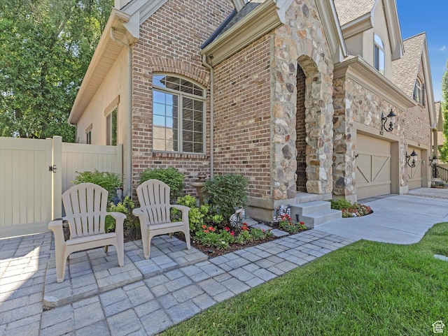 1832 E Cottonwood Glen Ct, Salt Lake City, UT 84117 - view of patio / terrace featuring driveway