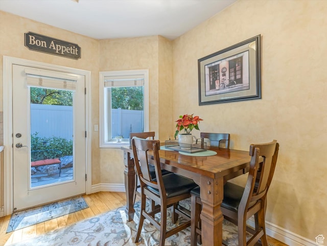1832 E Cottonwood Glen Ct, Salt Lake City, UT 84117 - dining space featuring light wood-style flooring and baseboards