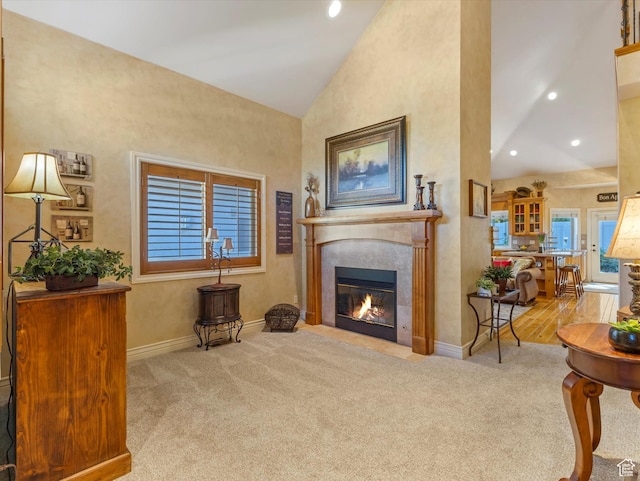 1832 E Cottonwood Glen Ct, Salt Lake City, UT 84117 - sitting room with lofted ceiling, carpet floors, a tiled fireplace, and recessed lighting
