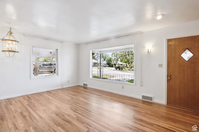 3622 Jackson Ave, Ogden, UT 84403 - entryway with plenty of natural light and light wood-style floors