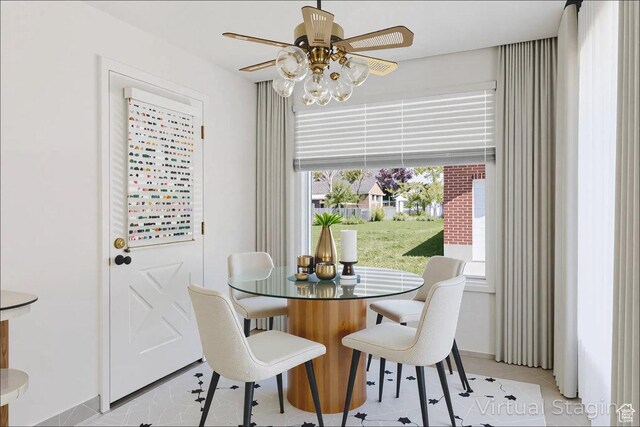 3622 Jackson Ave, Ogden, UT 84403 - dining room with a ceiling fan and tile patterned floors
