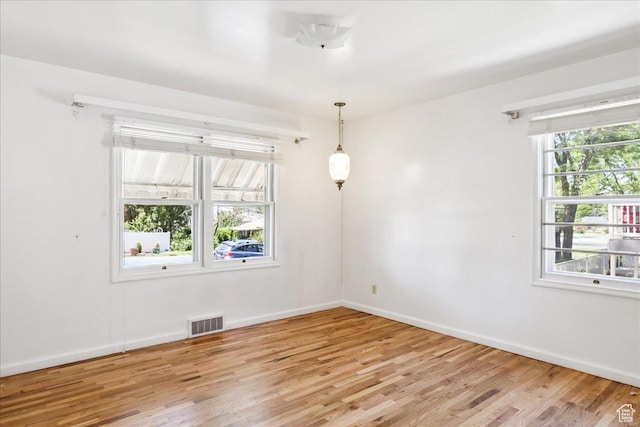 3622 Jackson Ave, Ogden, UT 84403 - unfurnished room with light wood-style flooring and baseboards